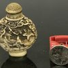 Qing Dynasty Ivory Relief Snuff Bottle in Qianlong period