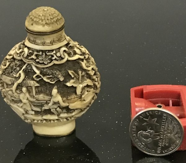 Qing Dynasty Ivory Relief Snuff Bottle in Qianlong period Qing Dynasty Ivory Relief Snuff Bottle in Qianlong period